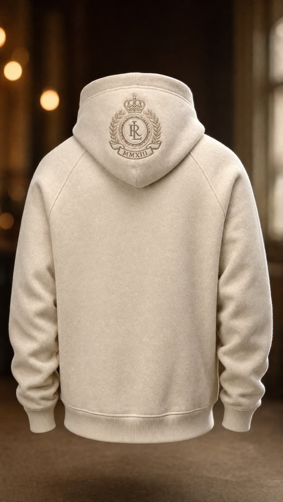 Cream heavyweight hoodie — back view, embroidered crest on hood
